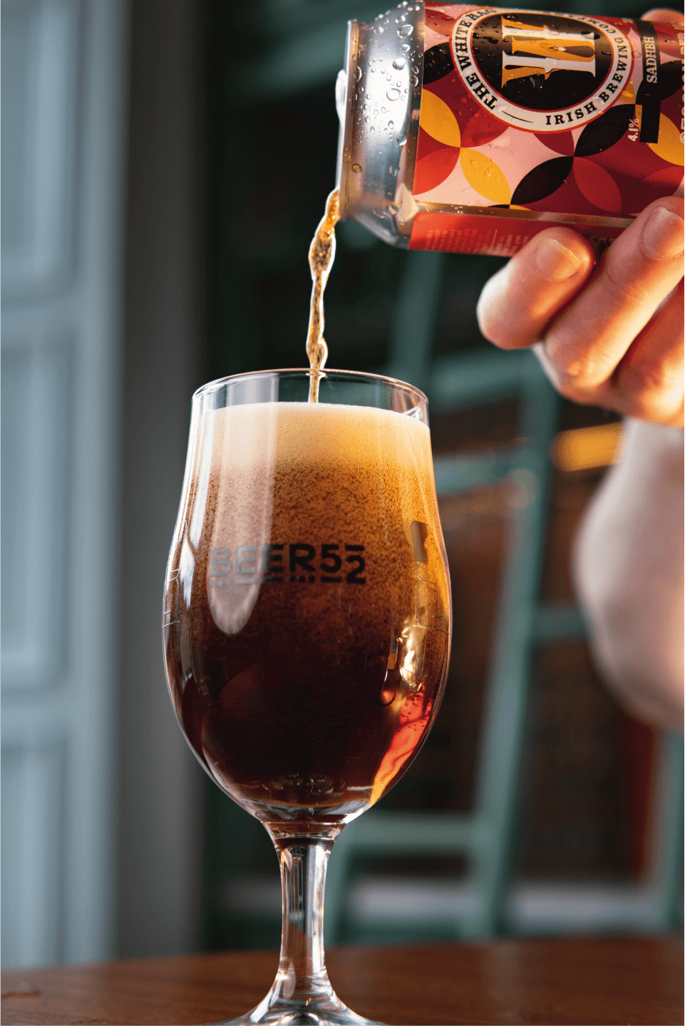 The White Hag beer being poured into a Beer52 glass