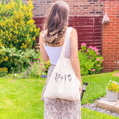 Shannon wearing her best selling 'Floral Tote Bag' in the garden in summer