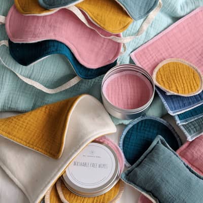 A collection of planet-friendly, reusables including face wipes and baby wipes