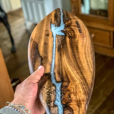 Surf board shape serving board