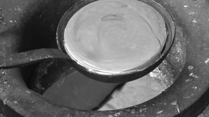 Hand pouring molten pewter (lead free of course)