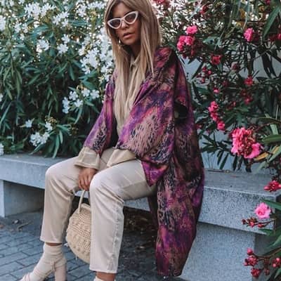 Purple leopard kimono paired with white trousers