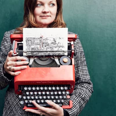 Keira Rathbone typewriter artist typing from life finger on typewriter key tower bridge in the background, typing of tower bridge on the typewritten page