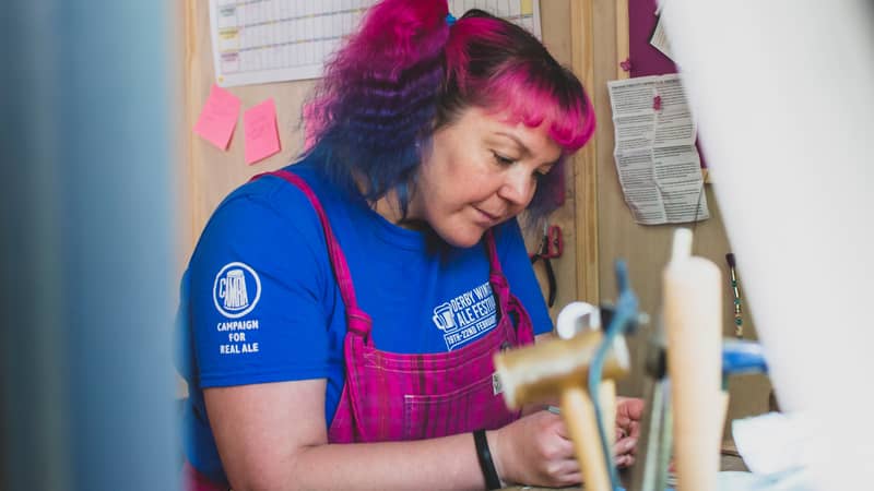 CRZyBest at her workbench