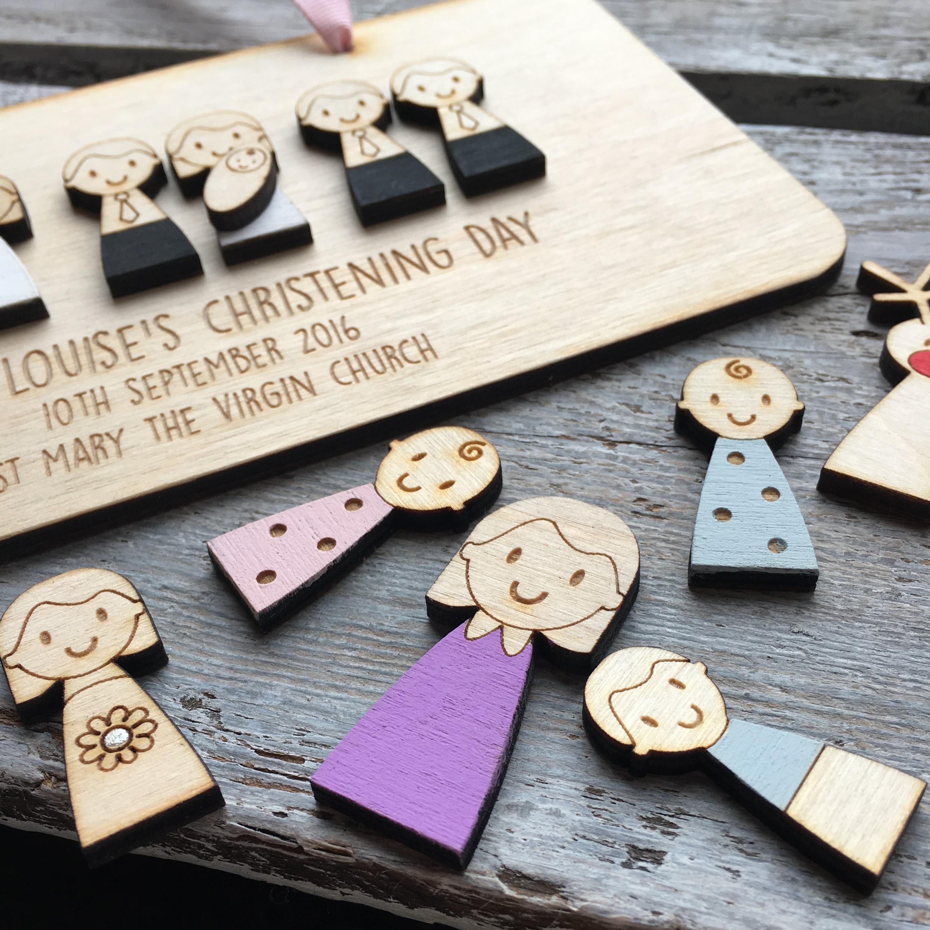 Figures and a christening plaque