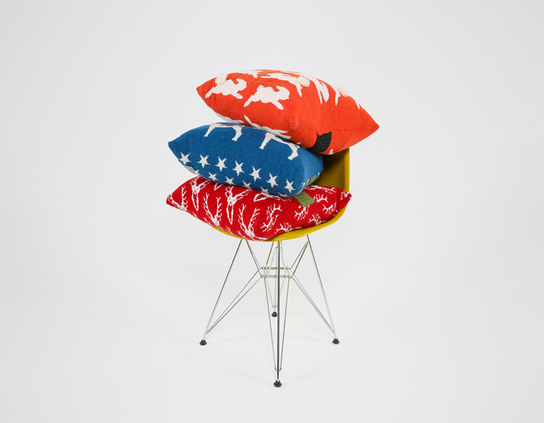 Knitted cushions bunny, stag and fox terrier