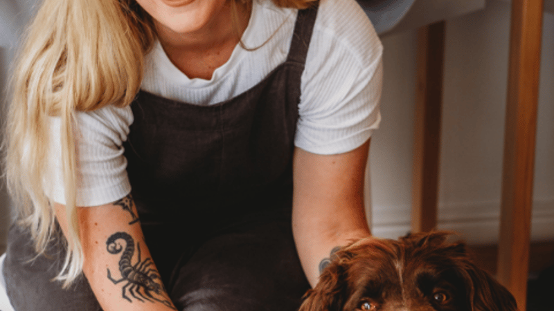 Headshot including the workshop dog