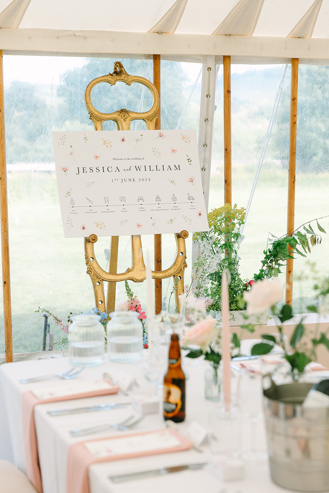 Wildflower themed wedding welcome sign with timeline