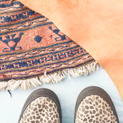 Antique Kilim rug and peach suede