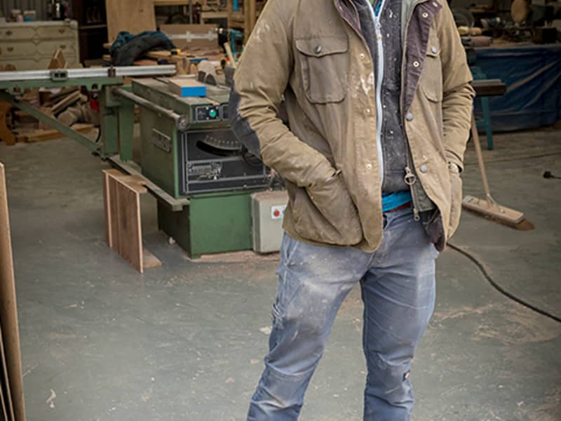 William Firth outside his Workshop