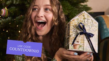 boy with christmas presents hero banner