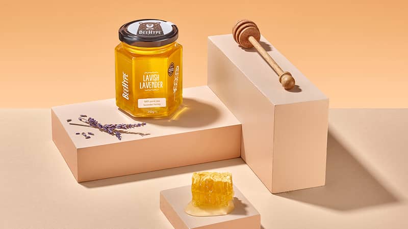 Girl receiving a gift beehype honey