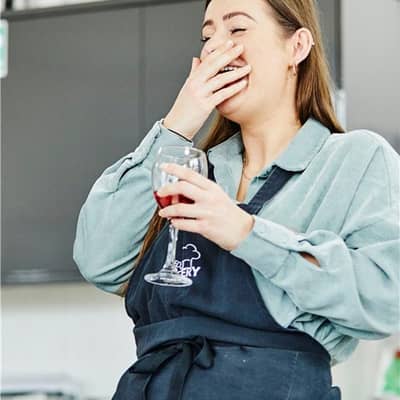 Enjoying an experience and a glass of wine at Leeds Cookery School