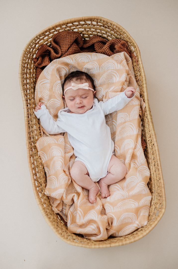 neutral rainbow muslin swaddle