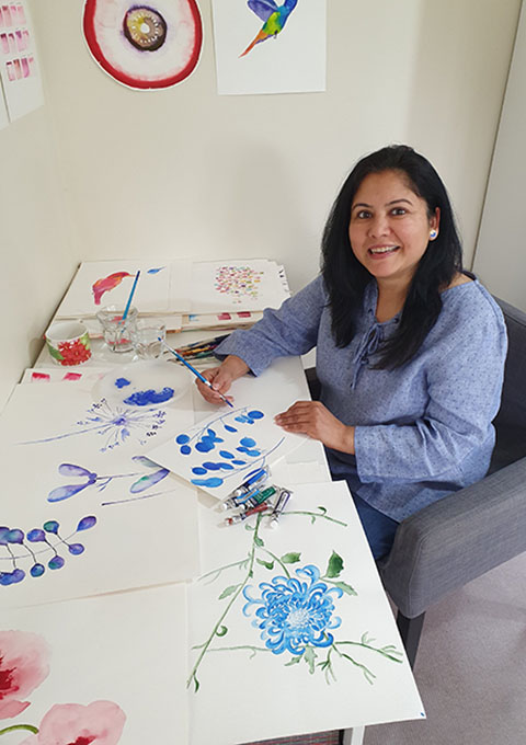 Hand painting the design