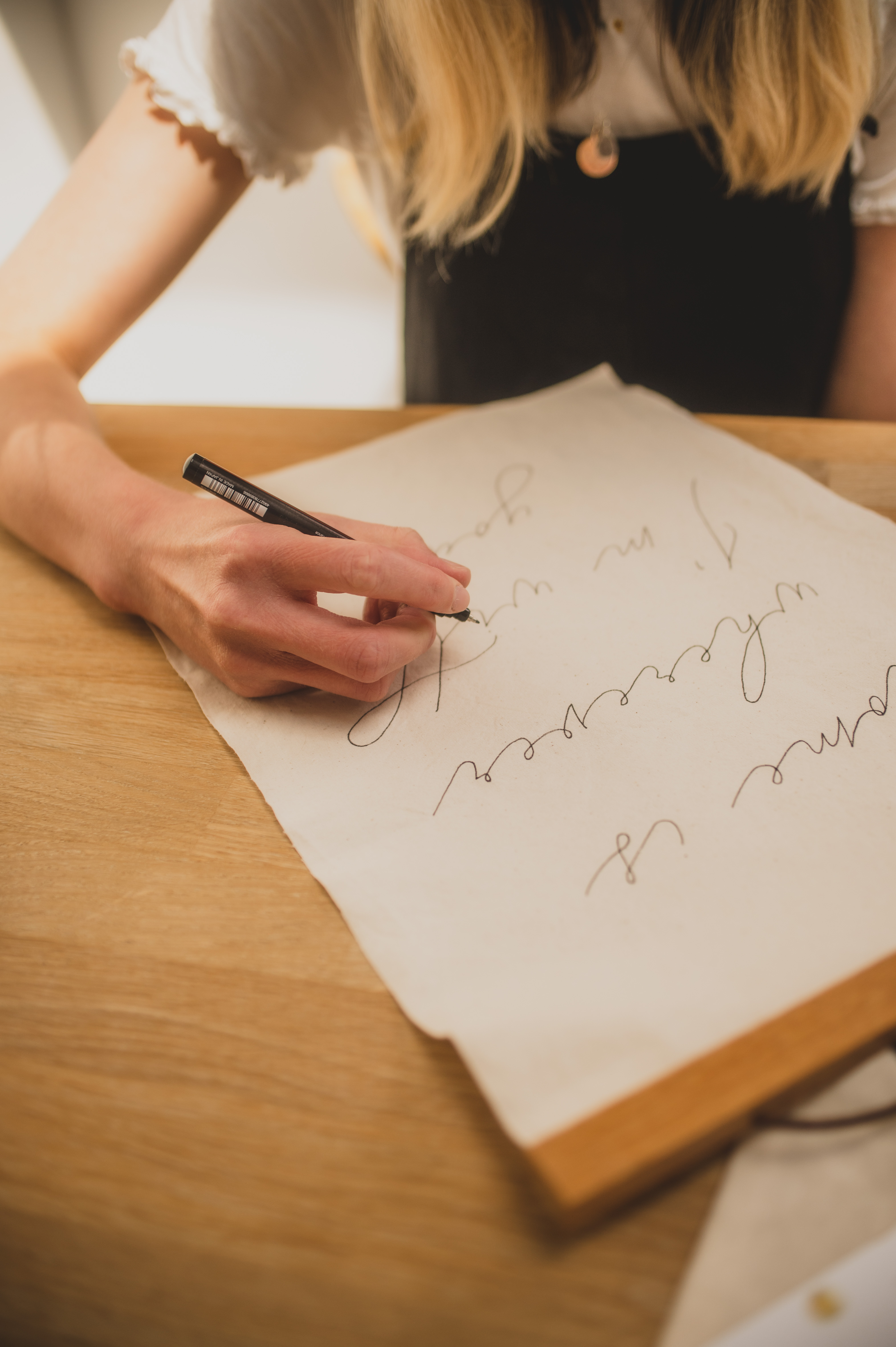 Fabric banner with handwritten calligraphy