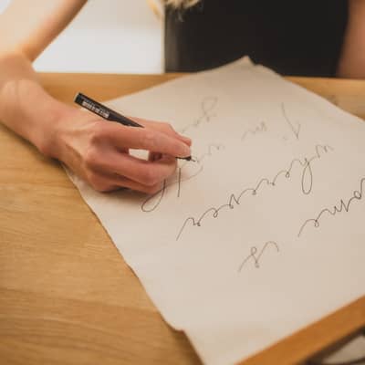 Fabric banner with handwritten calligraphy