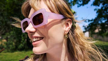 woman wearing pink sunglasses