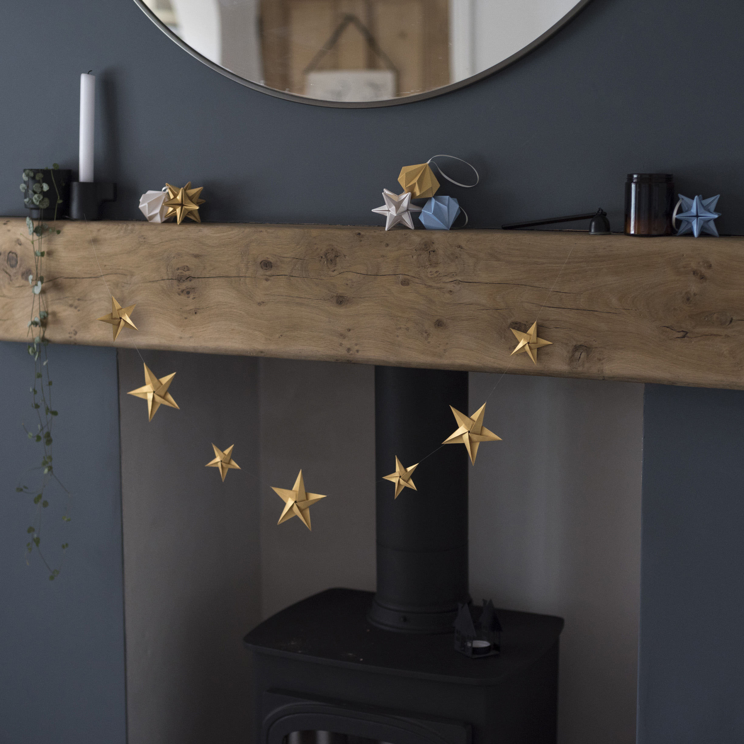 Origami Blooms Christmas decorations on fireplace