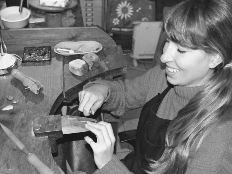 Designer-maker Kristina Summerfield at jewellery workbench