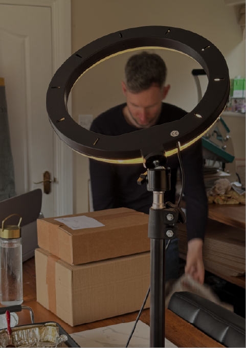 busy studio making customer personalised gift orders whilst using ring light to create social media content