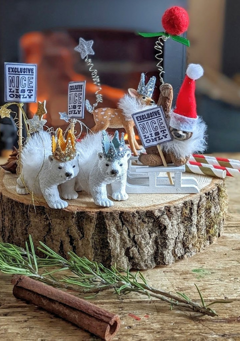 A party animal tiger and zebra both wearing party hats.