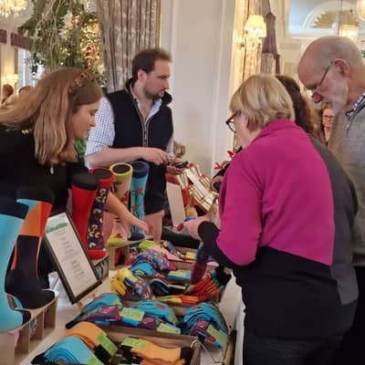 Simon selling socks at a local Christmas Market