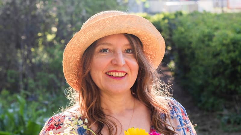 Elisabeth with flowers in her local park