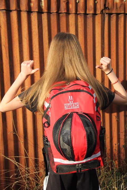 Girl wearing a red KITSACK