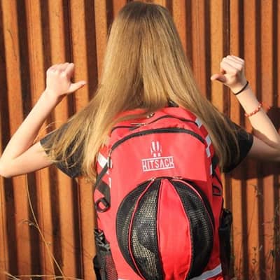 Girl wearing a red KITSACK