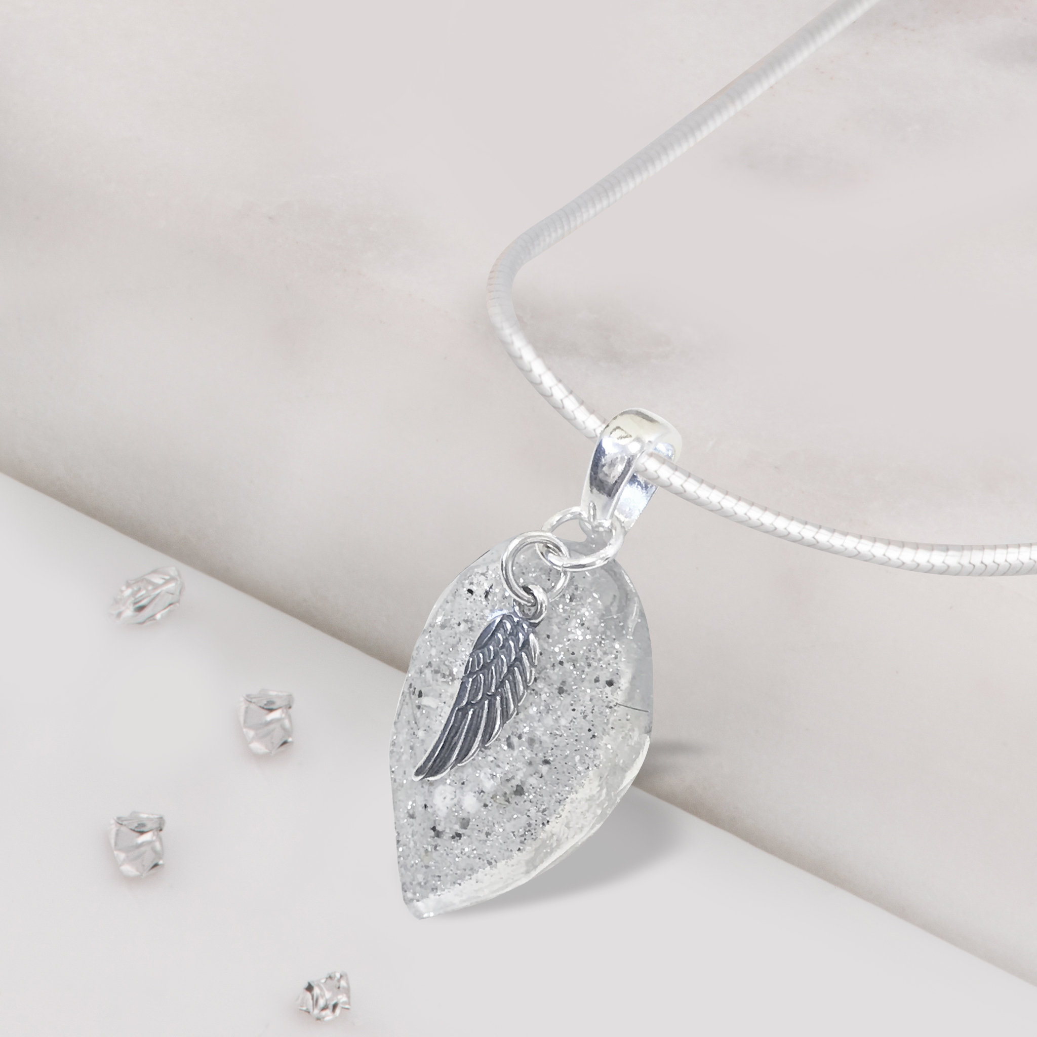 ashes and resin angel wing pendant 