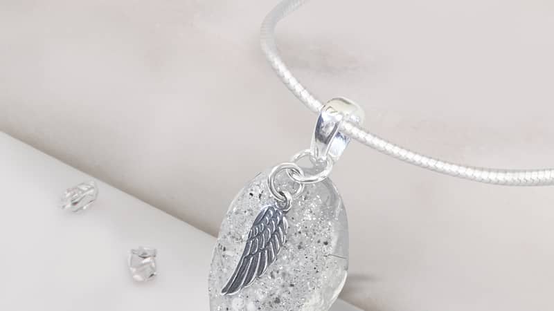 ashes and resin angel wing pendant