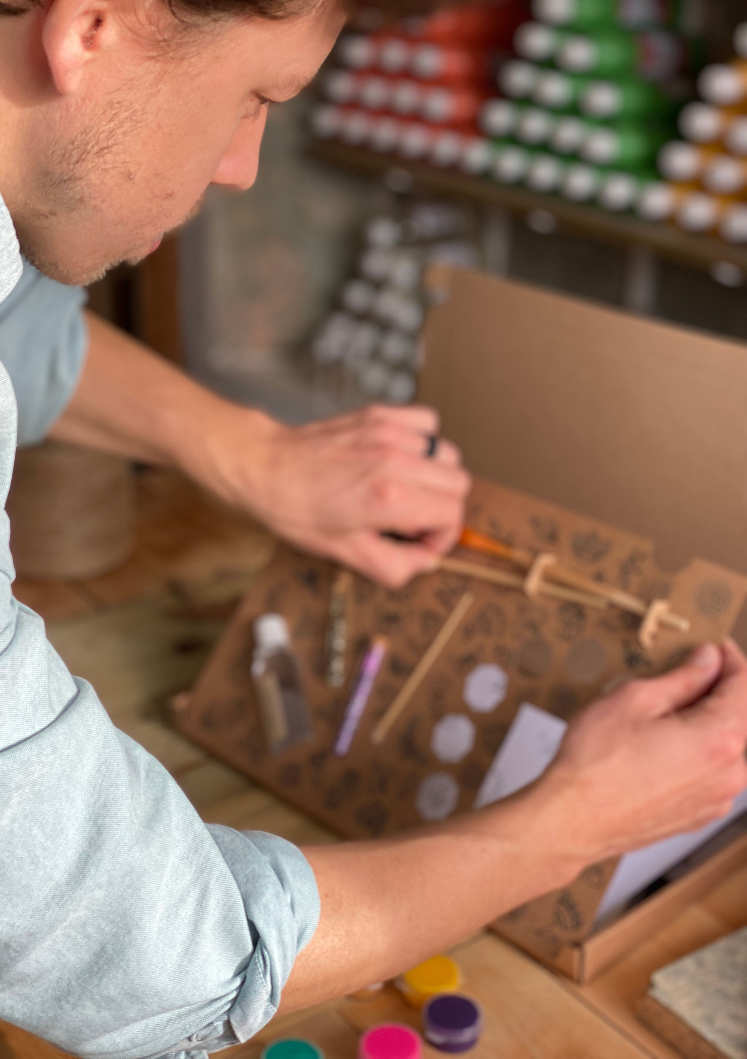 Founder, Ben, in the workshop preparing a craft set for dispatch.