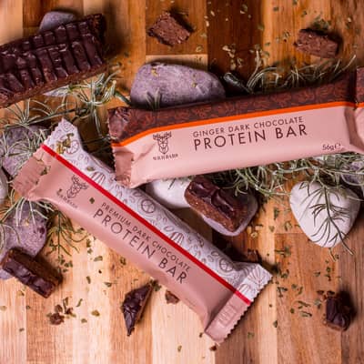 Photo of the dark chocolate premium protein bar and also the dark chocolate and ginger premium protein bar