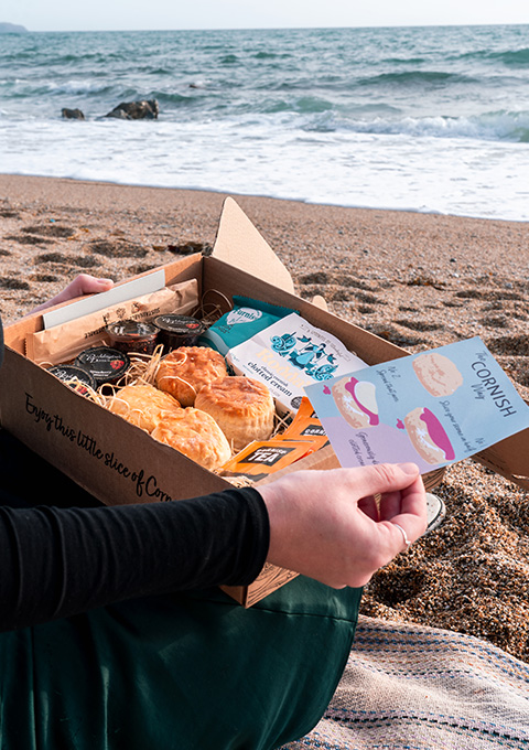 cornish cream tea on beach jam fresh scones clotted cream afternoon tea