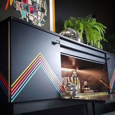 Vintage_mid_century_cocktail_sideboard_with_metallic_geometric_design