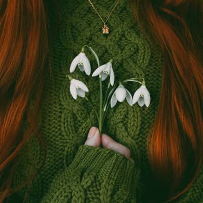 Model wearing gold cottage necklace