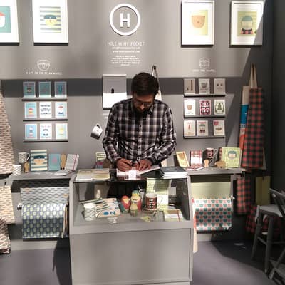 Surrounded by products at a trade show