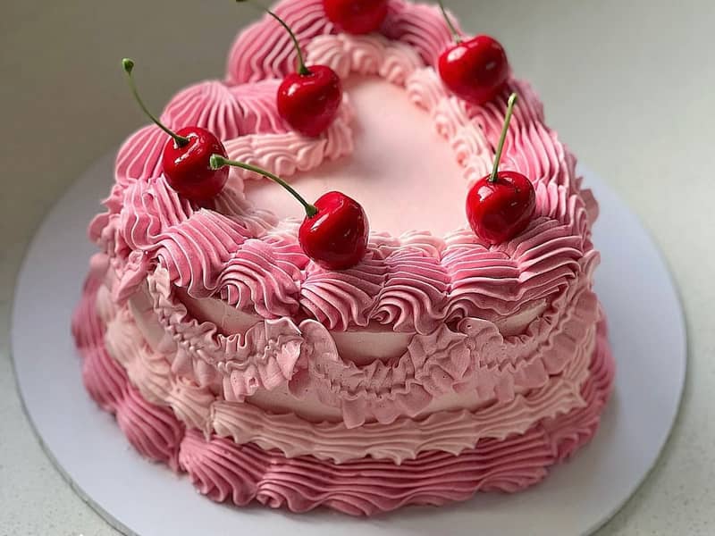 Our best selling fake cake topped with cherries