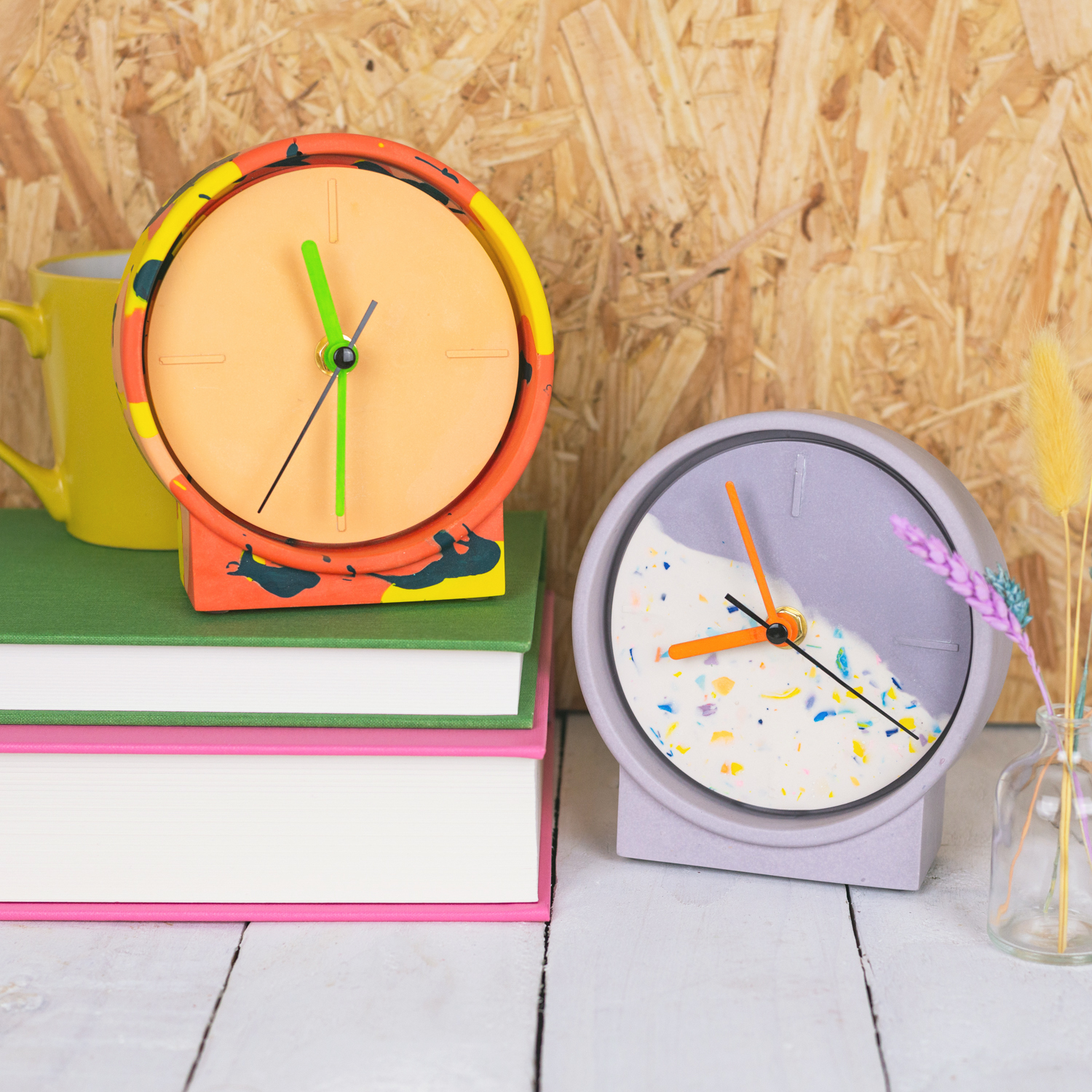 Colourful jesmonite clocks.