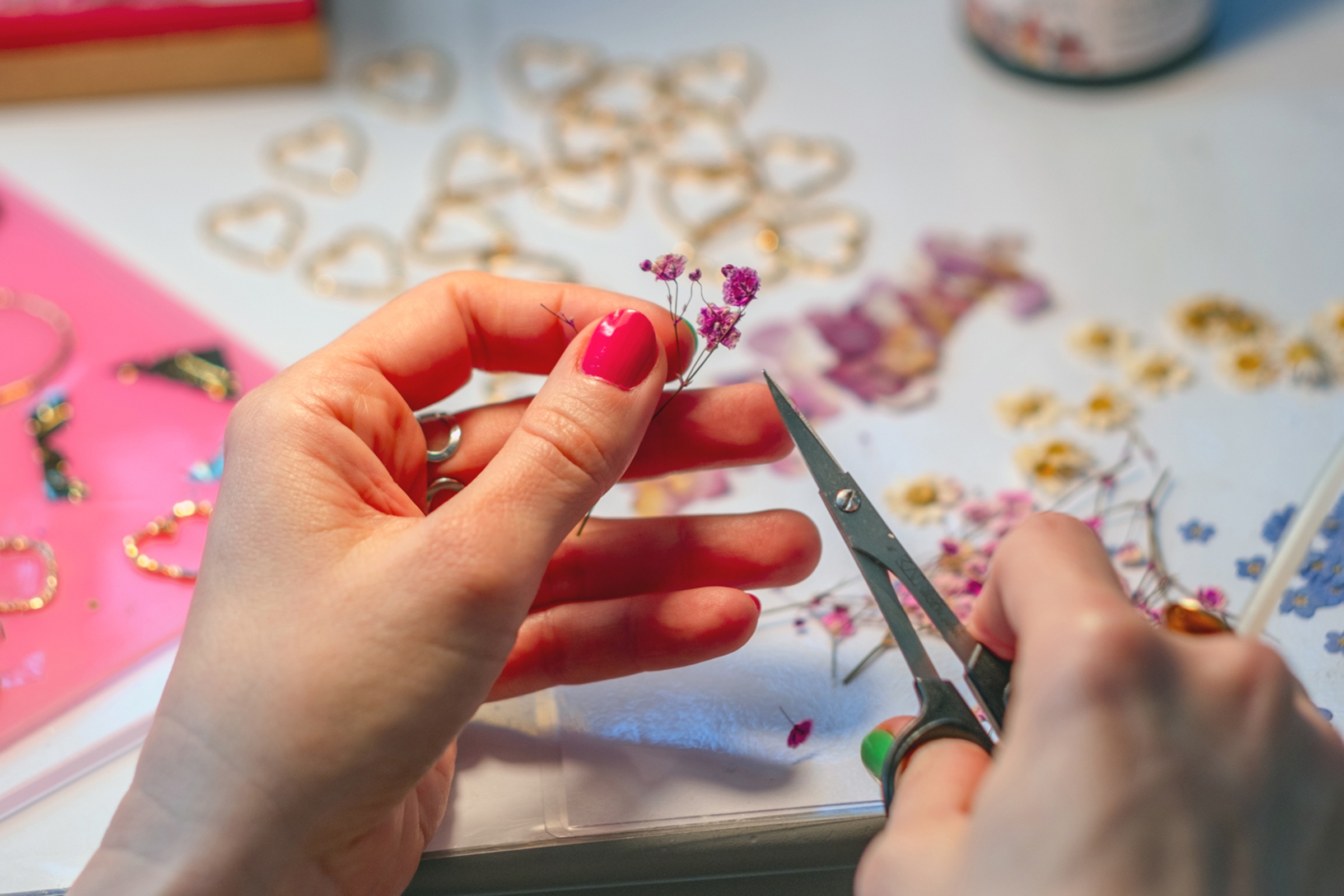 Elisabeth's hands creating the jewellery