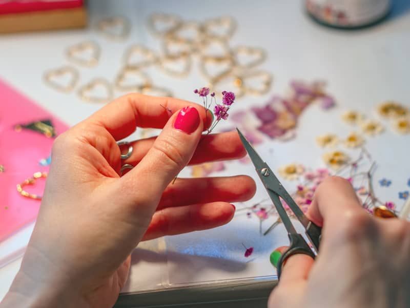 Elisabeth's hands creating the jewellery