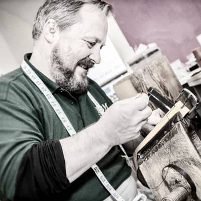 Mark handstitching a belt