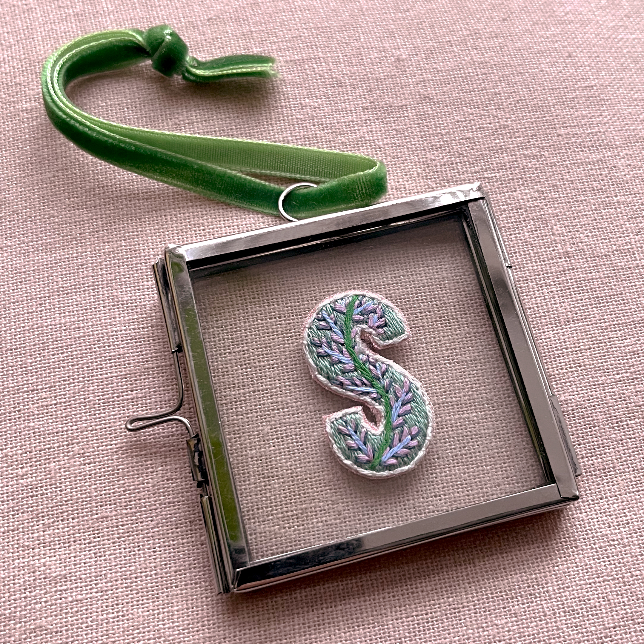 Hand embroidered letter
