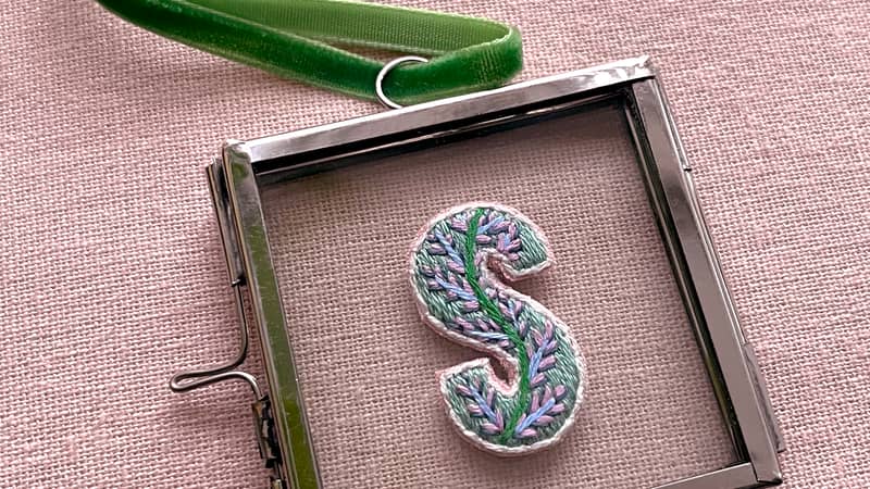 Hand embroidered letter