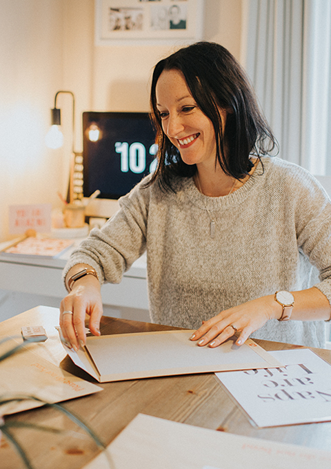 Packaging orders at the dining room table.