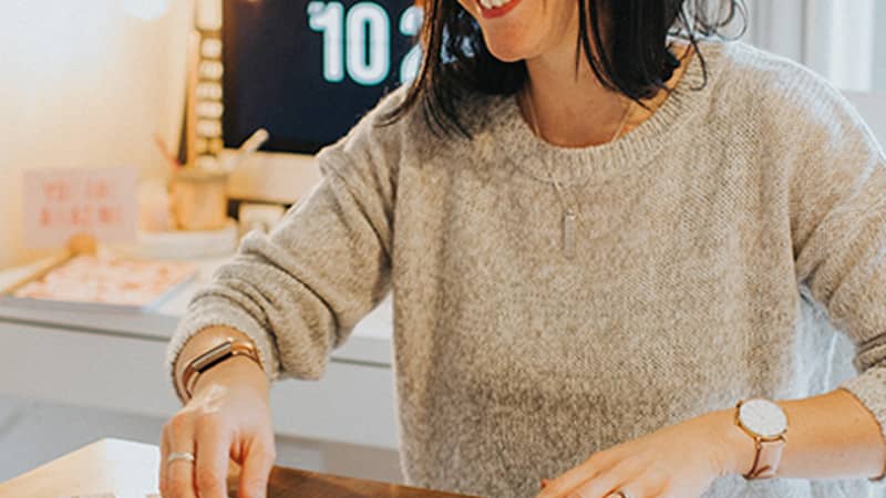 Packaging orders at the dining room table.