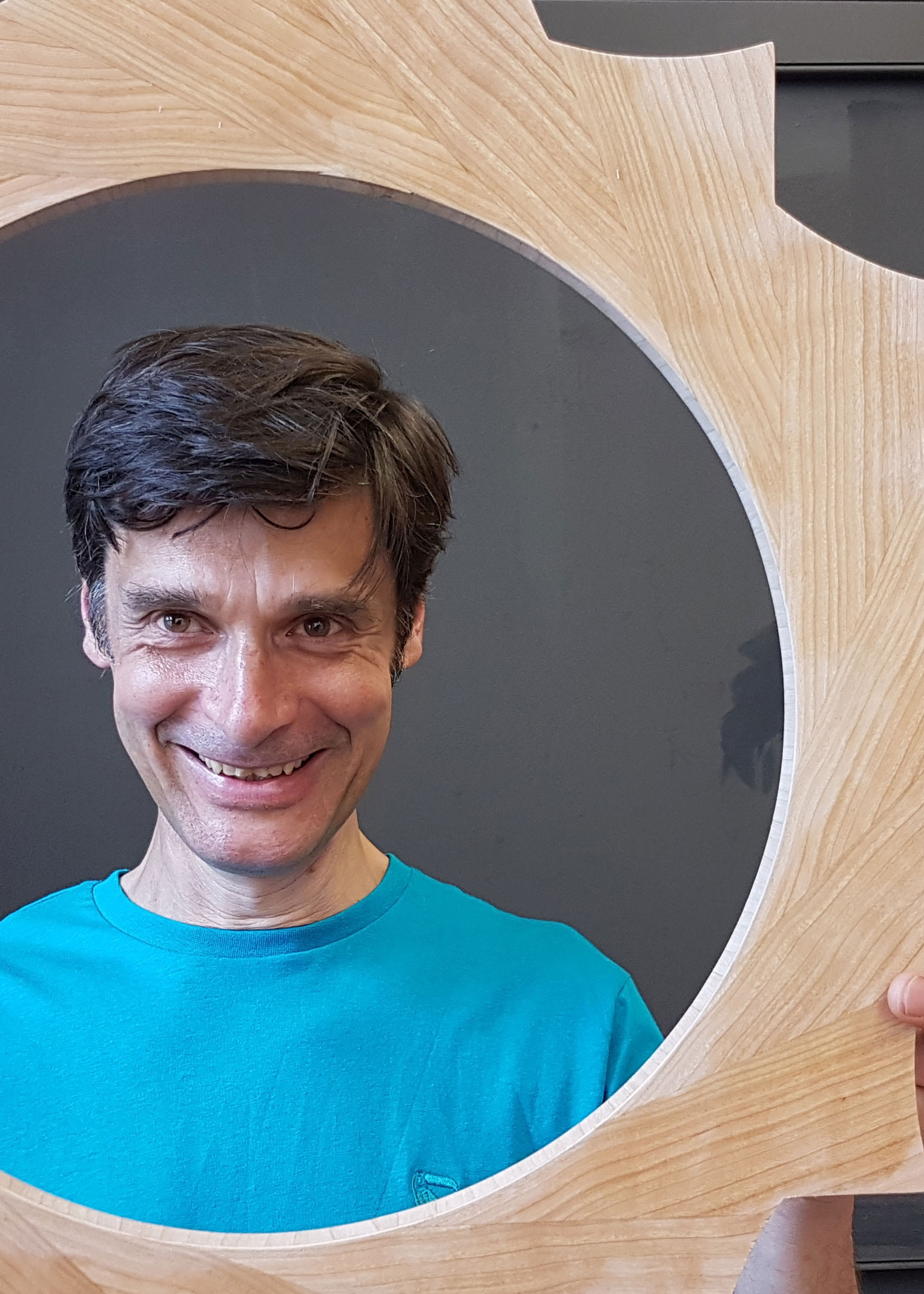 Roland's face within a mirror frame. 