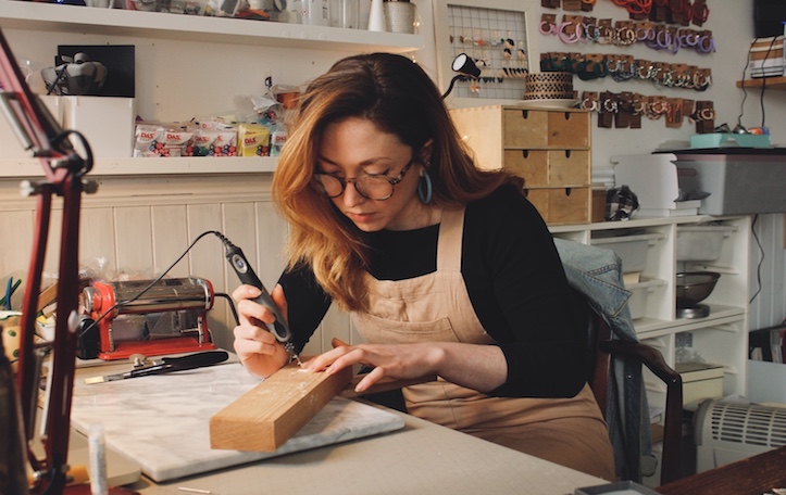Designer Laura at work in her studio.