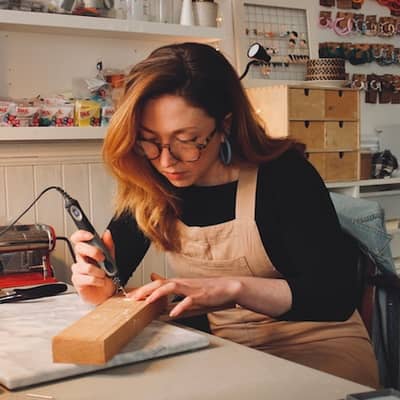 Designer Laura at work in her studio.